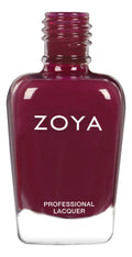Zoya Kendra nail polish bottle with deep red shade and glossy finish, displayed on a neutral background.