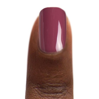 Zoya Mai nail polish bottle with vibrant coral-orange shade, showcasing the Zoya brand logo on the cap.