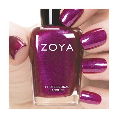 Zoya Mason nail polish in a deep mauve shade with a glossy finish displayed in its bottle against a neutral background.