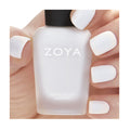 Zoya Aspen nail polish bottle with light, creamy beige color, showcasing the Zoya brand and sleek packaging design.