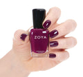 Zoya Tara nail polish bottle with vibrant blue color, showcasing the Zoya brand and sleek packaging design.