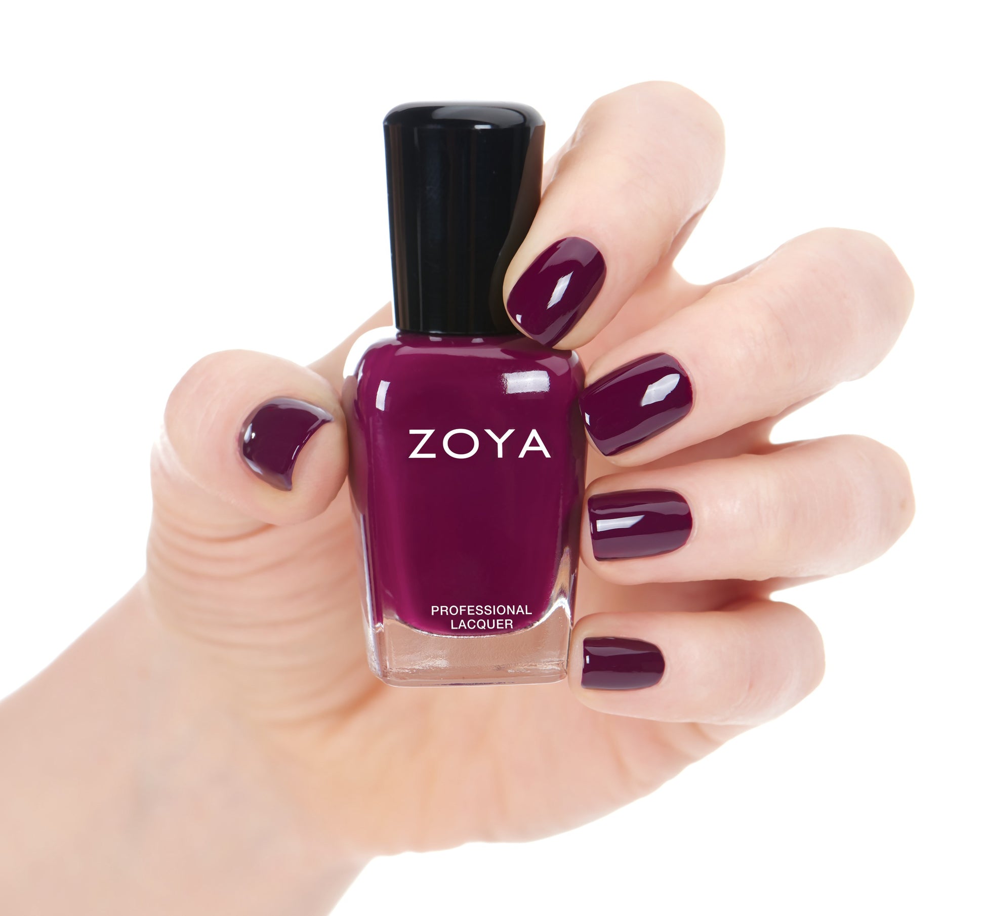 Zoya Tara nail polish bottle with vibrant blue color, showcasing the Zoya brand and sleek packaging design.