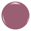 Zoya Odette nail polish bottle with open cap, showing soft pink shade, on a white background.