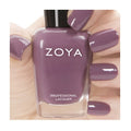 Close-up of Zoya Odette nail polish bottle with a clear view of the label and the vibrant, glossy nail polish inside.