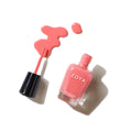 Zoya Polly nail polish bottle with vibrant pink shade, showcasing the Zoya brand and sleek packaging.
