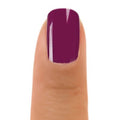 Zoya Ripley nail polish bottle with sleek black cap and clear glass displaying vibrant pink nail polish.