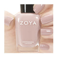 Zoya Rue nail polish bottle with deep mauve shade and sleek branding, displaying the Zoya logo on the label.