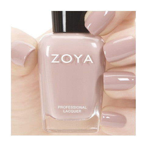 Zoya Rue nail polish bottle with deep mauve shade and sleek branding, displaying the Zoya logo on the label.
