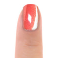 Zoya Solstice nail polish bottle with vibrant, shimmering orange and gold shades, showcasing the colorful cosmetic product.