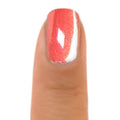 Zoya Solstice nail polish bottle with vibrant orange and gold shades, showcasing the colorful packaging and glossy finish.