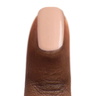 Zoya Tatum nail polish bottle with deep mauve color, showcasing the Zoya brand and product label.