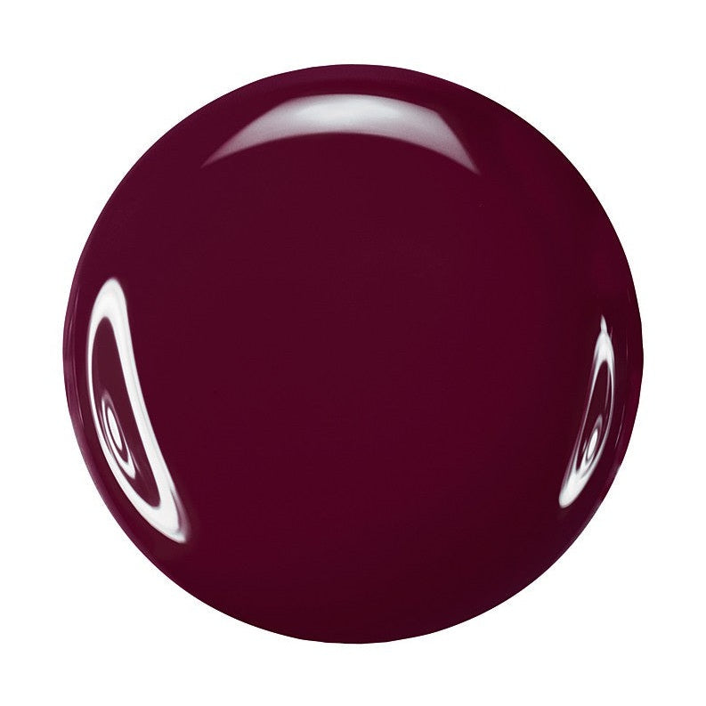 Zoya Toni nail polish bottle with deep plum-colored liquid and minimalist label, showcasing vibrant color and sleek design.