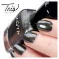 Zoya Tris nail polish bottle with a sleek design, showcasing the Zoya brand and the vibrant nail polish color inside.