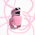 Zoya Tweedy nail polish bottle from Zoya's nail polish collection, featuring a deep, warm brown shade with a glossy finish