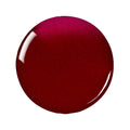 Close-up of Zoya Vanessa nail polish bottle showing the sleek glass container and the vibrant, creamy nail polish color.