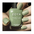 Zoya Vespa nail polish bottle with vibrant orange nail polish swatched on a hand.