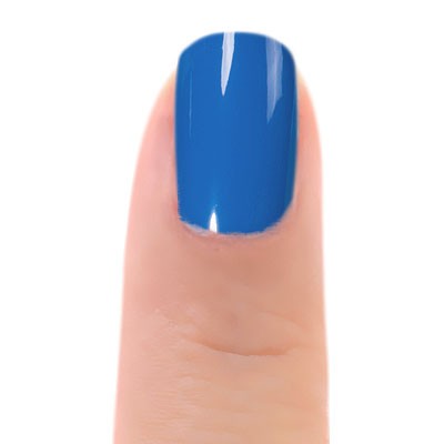 Close-up of Zoya Walker nail polish bottle with the cap removed, showcasing the vibrant, glossy pink shade.