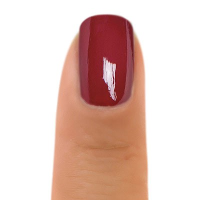 Zoya Yvonne nail polish bottle with vibrant pink color and sleek design, showcasing the Zoya brand on the label.